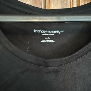 Mid length sleeveless black maternity dress